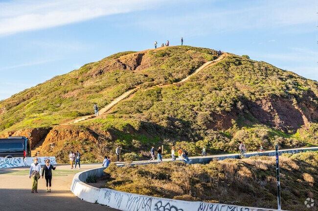 A pathway leads to the top of one of the Twin Peaks.