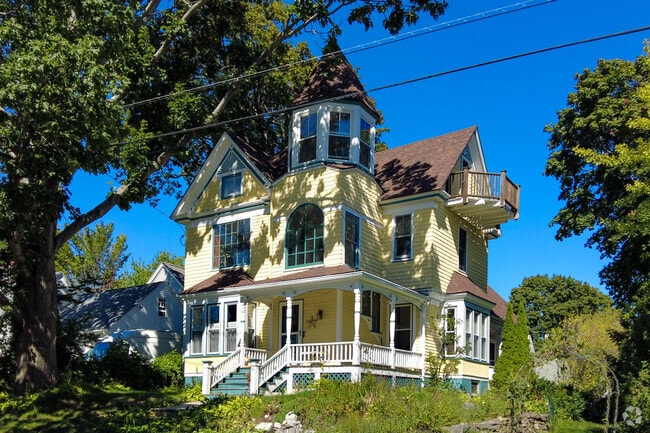 This large colorful Victorian-style home is in the Rosemont neighborhood.