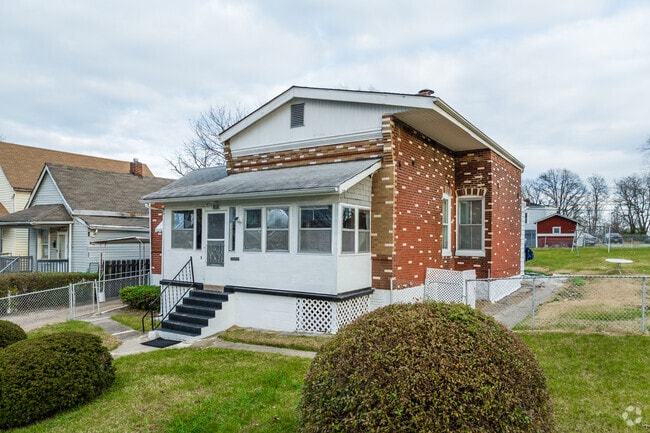 This unique home in Wells/Goodfellow looks as if there was an addition to the front entrance.