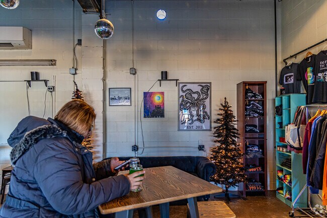 Enjoy some draft beer and appetizers at Far From the Tree near Mark Park.