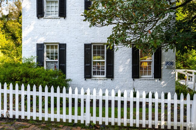 Enjoy the traditional look of a white picket fence in the Dickeyville neighborhood.