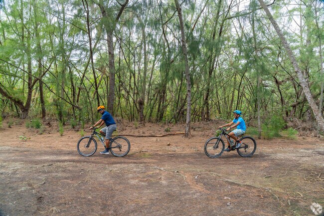 You can bike along scenic trails in Oleta River Park.