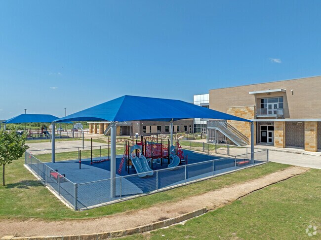 The playground at Lagos Elementary School are covered to keep the kids cool on hot weather days.