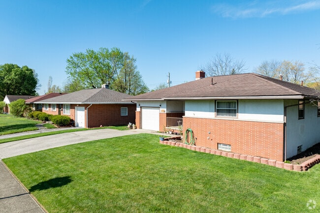 Cozy mid-century bungalows and ranch-style homes sit on half-acre plots.