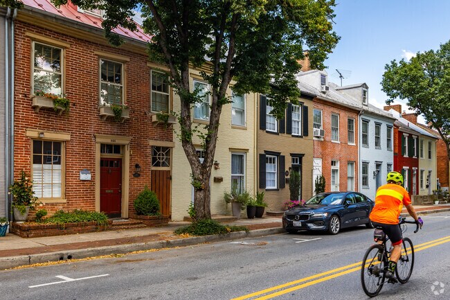 Stunning row of civil war area row homes located on the Carrollton portion of Market Street.