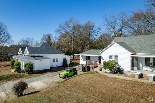 A row of homes with large front yards in Pickens.