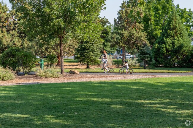 Visitors enjoy the paved trails at Al Moody Park in Mountain View.