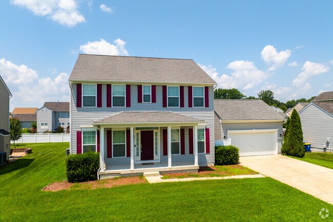 Colonial-style homes in Magnolia offer timeless curb appeal and spacious lots.