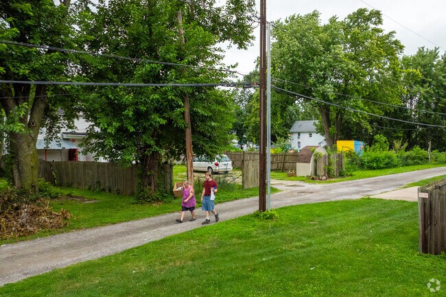 An influential green space is the Enos Park Neighborhood Gardens.