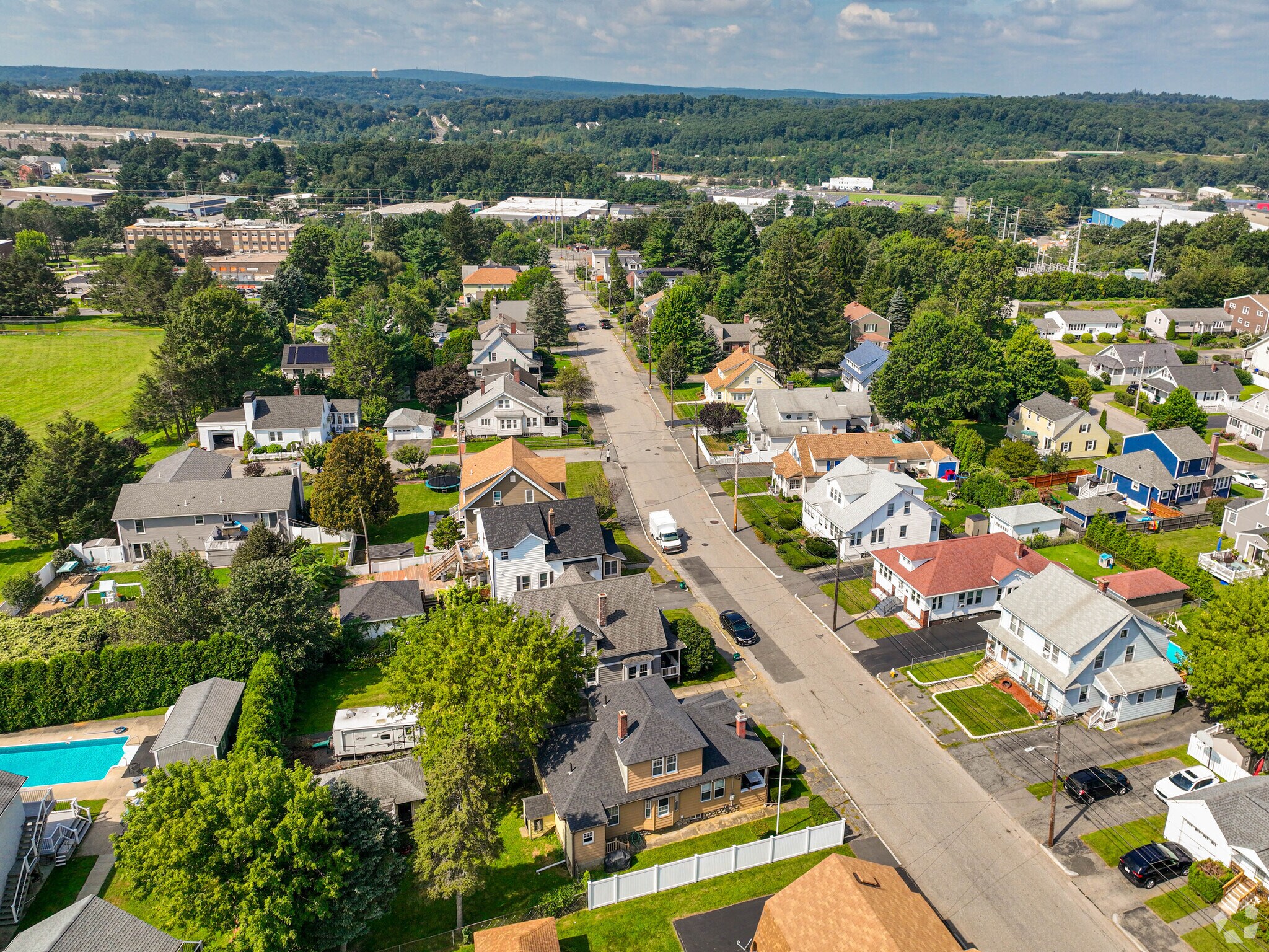 The charming houses in Greendale are spaced on smaller lots.