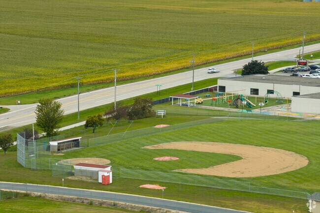 Wabasha-Kellogg Schools has a grass infield on their baseball field.