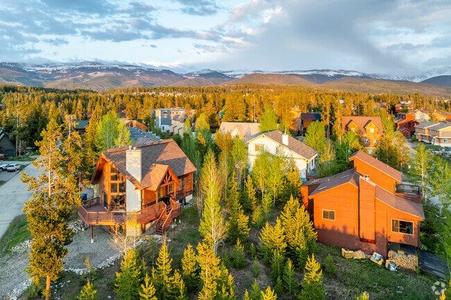Single-family homes blend with townhomes within the forests of the hills in Fraser.