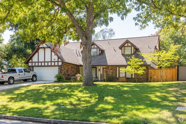 Nestled in Brookwood, a charming French-inspired home welcomes you with its elegance.