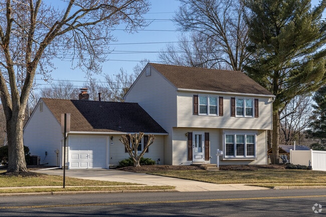 Tall trees surround some of the homes in Tenby Chase.