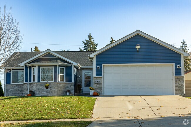 Siding and stone covered homes are found in the Stocker area.