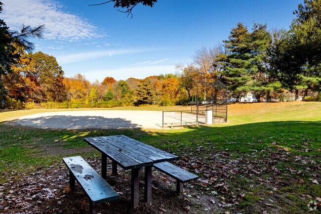 Sit and enjoy the day at Flat Top Pond Park in Crompton.