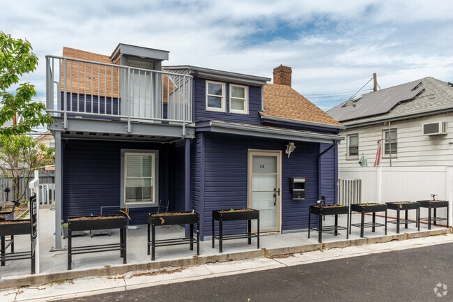 Homes like this colorful Dutch colonial can be found within Gerritsen Beach.