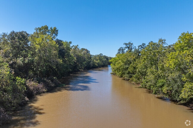 The Vermilion River attracts boaters and kayakers along Heymann Park.