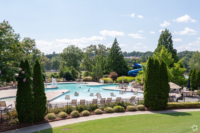 The main pool of Sterling on the Lake features multiple slides and a splash pad.