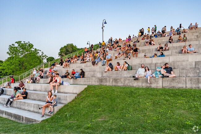 Locals admire the sunset at Lakewood's Solstice Steps.