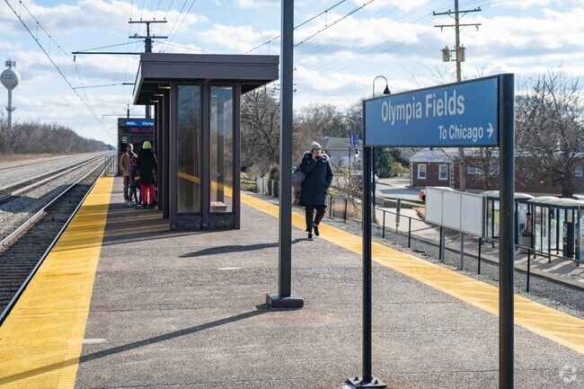 The Metra train goes from the Olympia Fields station to downtown Chicago in roughly an hour.