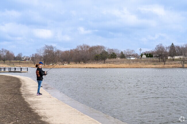 Residents can enjoy fishing on the 12-acre lake at Centennial Park.