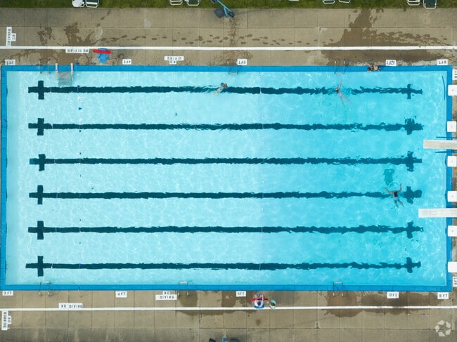 Delshire Swim Club members can enjoy its 5,000 square foot pool with diving boards.