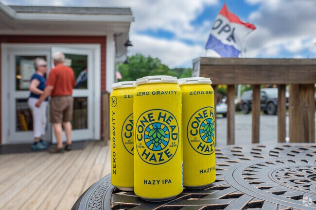 After a day of hiking and biking Mount Ascutney, Windsor residents enjoy a cold beverage from Brownsville Butcher & Pantry.
