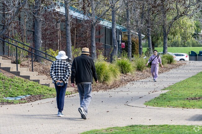 Enjoy a relaxing day at Acalorado Park, featuring walking paths and beautiful scenery.