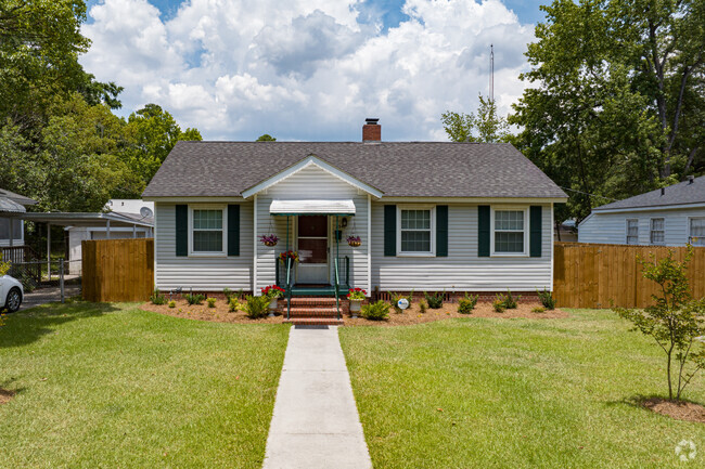 Victory Heights homes feature large front yards and paved pathways.