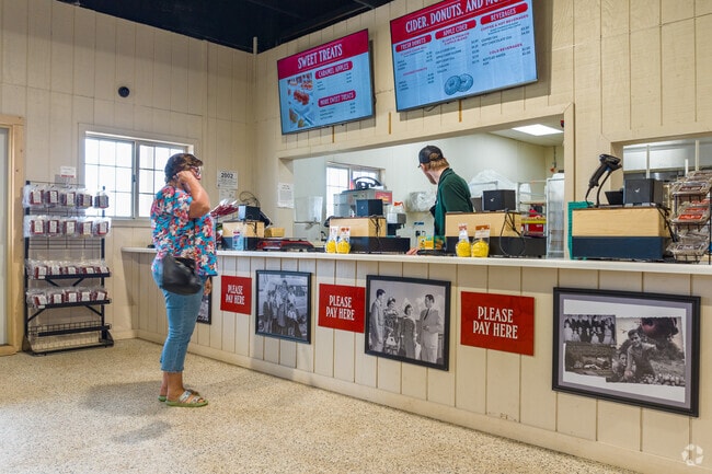 Order fresh baked cinnamon donuts and cider at Lyon's Blake's Orchard & Cider Mill.
