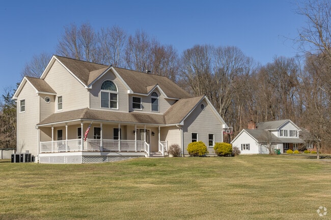 Some New Traditional homes in East Fishkill come complete with large porches.