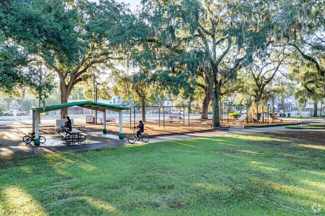 Residents bike, walk, and gather at Wells Park throughout the day.
