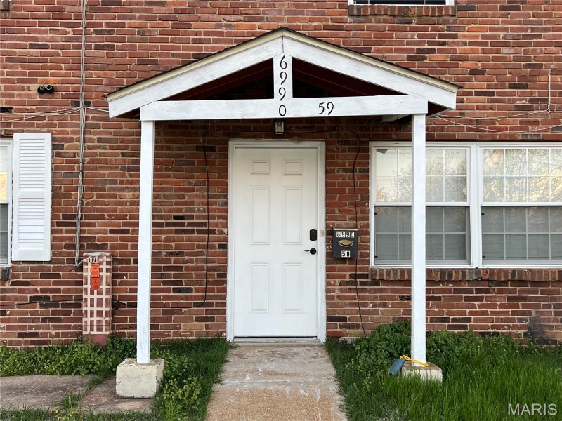 6990 Colonial Woods Dr unit 59, Saint Louis, MO 63129 - photo 1