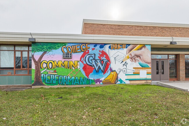 Mural art greets the students of George Washington High School in Chicago's East Side community.
