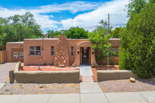 Pueblo style homes are common around West Mesa.
