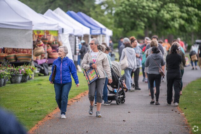 Walk the Lakewood Farmers Market with friends for a relaxing afternoon.