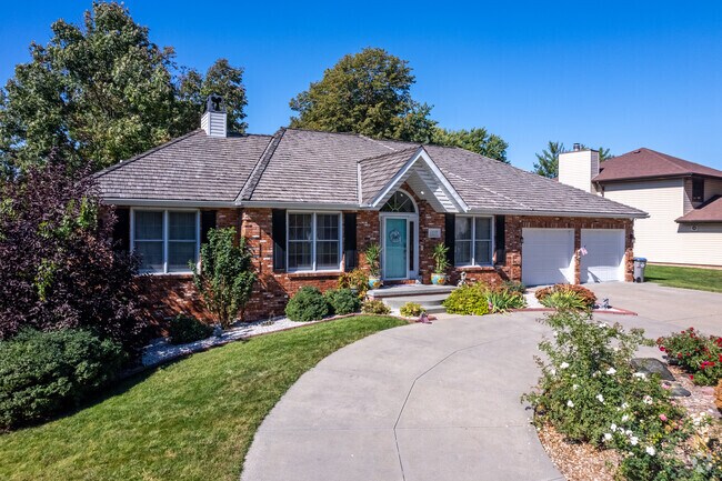 A lovely brick ranch-style home is visible in Salt Valley View.