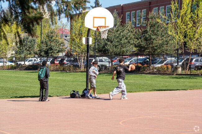 Teens enjoy several basketball courts throughout the neighborhood.