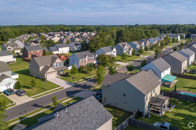 Colonial-style homes from the 2000s are common in Steele Creek.