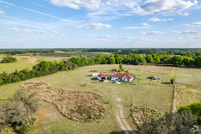 A beautiful older ranch-style home on multi-acre lots in Mascotte.