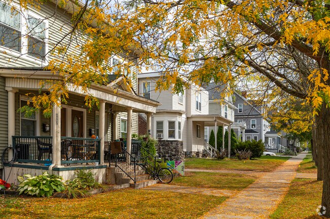 Sidewalks throughout Germantown are tree-shaded tunnels past rows of Queen Anne homes.