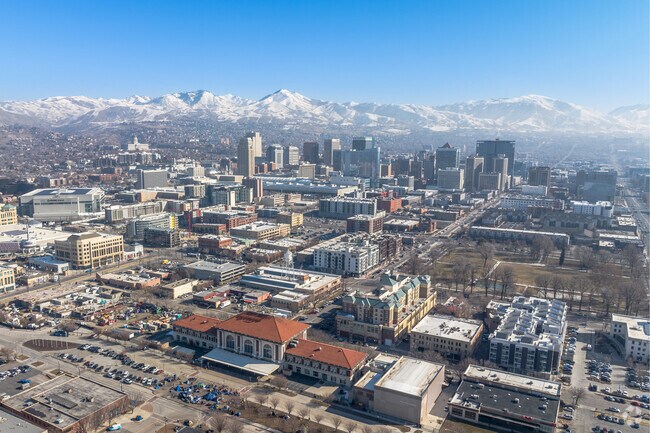Overview of Downtown Salt Lake City with the mountain range on the horizon.