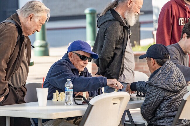 Chess games bring neighbors together at Ed Hales Park in Downtown Redlands.