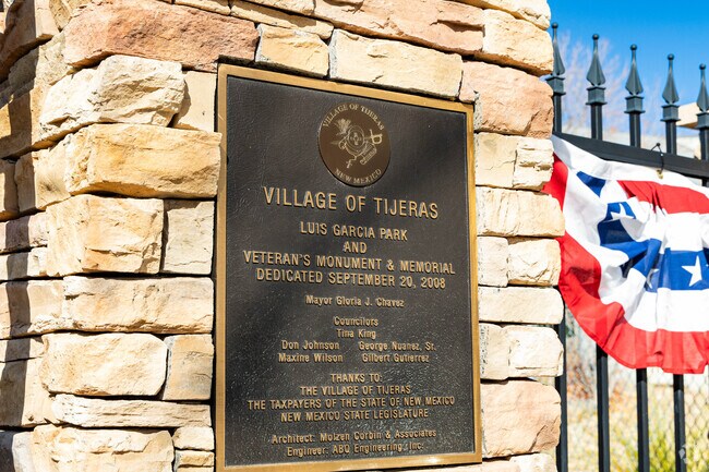 Luis Garcia Park and Veteran's Monument on Tijeras Avenue includes a playground and a commemorative monument with bronze plaques in honor of veterans of the Vietnam War.