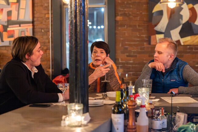 Friends enjoy a post work beverage at the beloved Public Eat and Drink in North Adams.