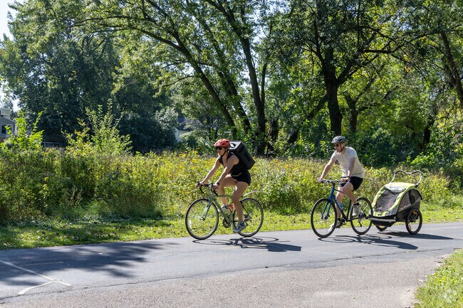 Residents of Cobblecrest often bike the trails of Texa-Tonka Park as a family.