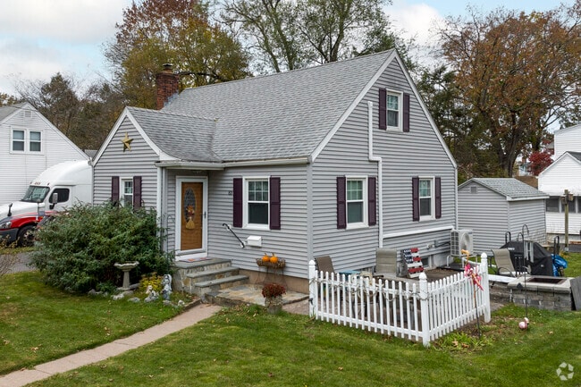 An iconic small home on the corner of Crestwood Drive and Devon Drive.