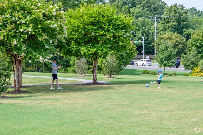 Short Pump park is a great place for a game of soccer on a hot summer day.