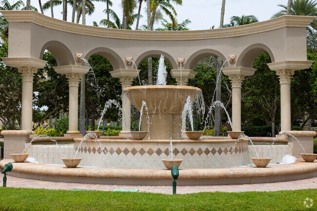 A beautiful fountain welcomes drivers entering the Villaggio gated community.